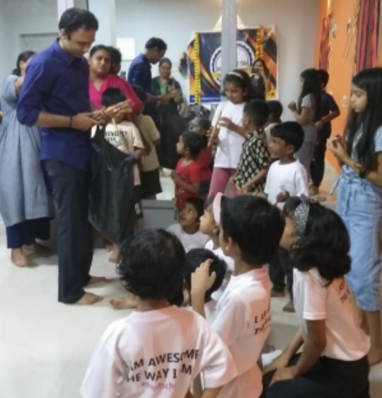 Prashanth Ramesh with students at an event