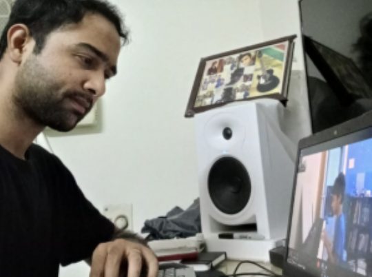 Prashanth Ramesh working at his studio desk