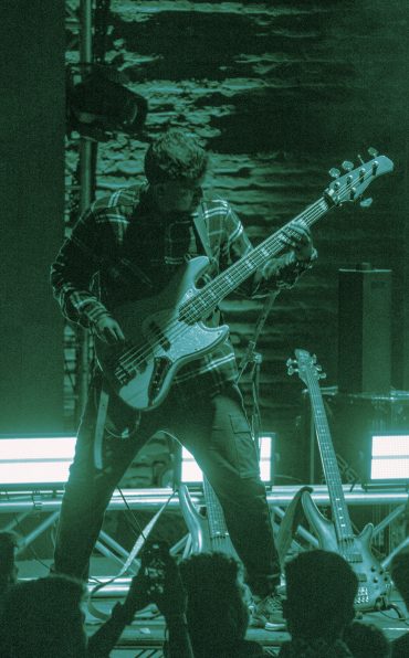 Bassist performing with The Levites