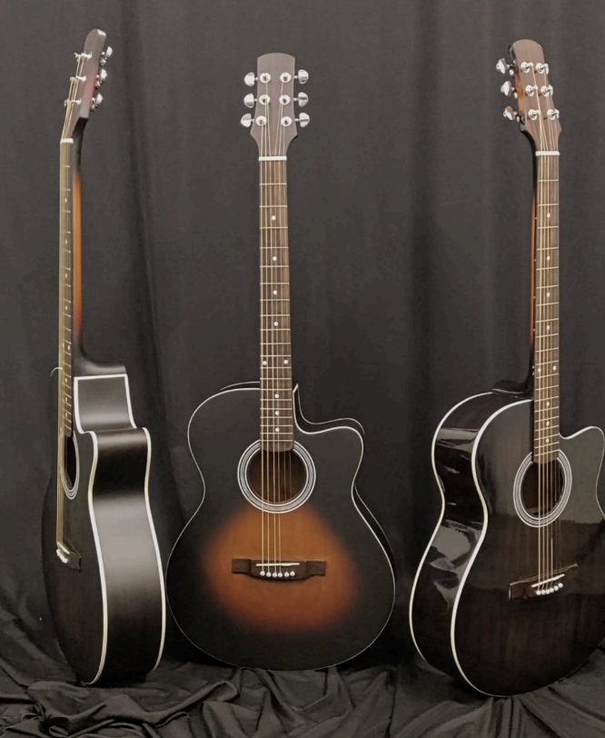 A lineup of three Aqualib acoustic guitars