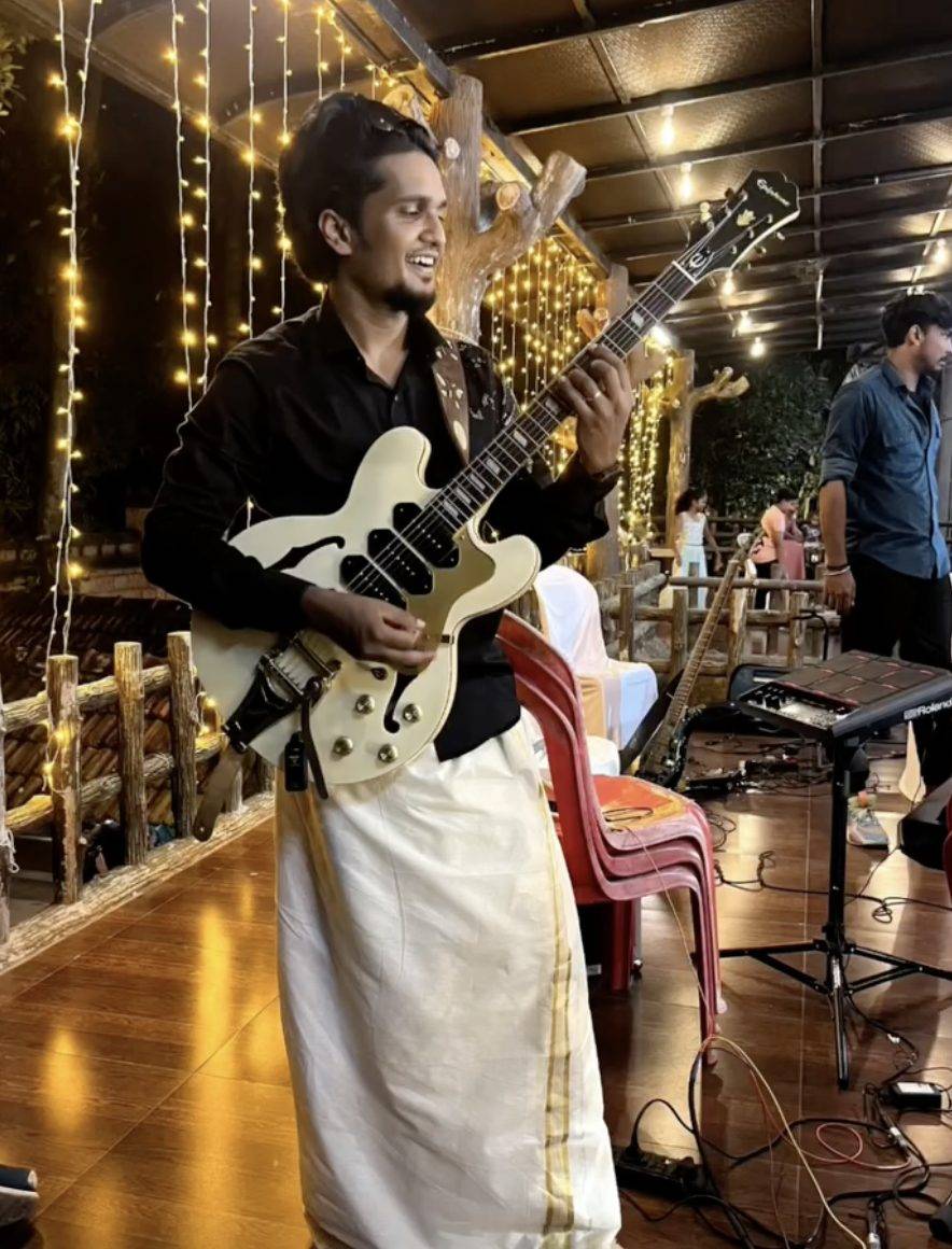 Vamsi Nath performing in a traditional mundu