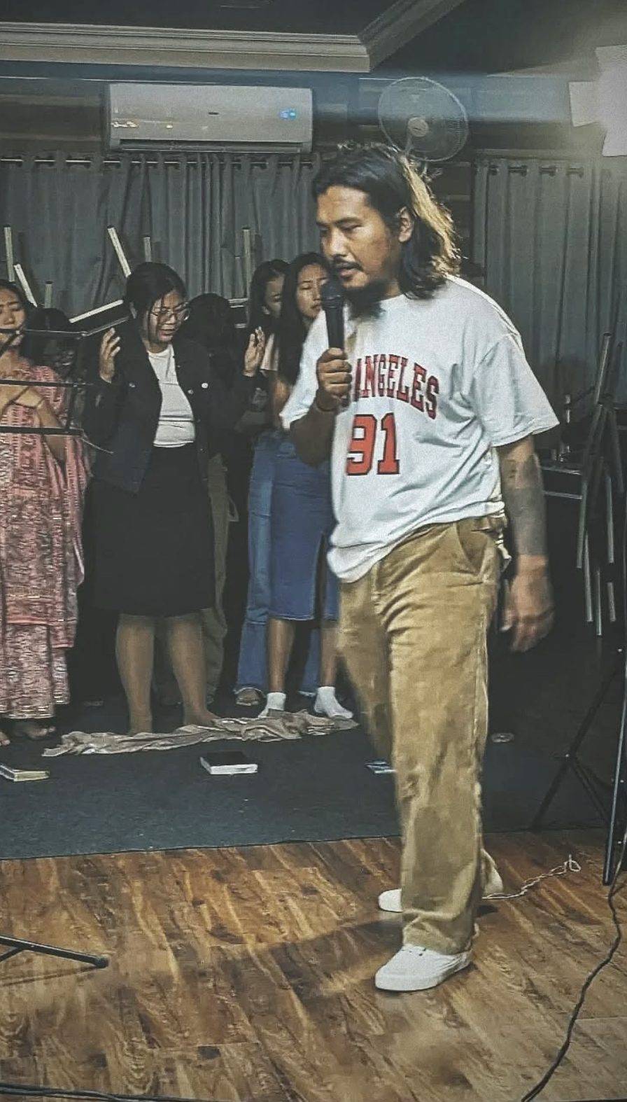 Temjen Longkumer leading worship